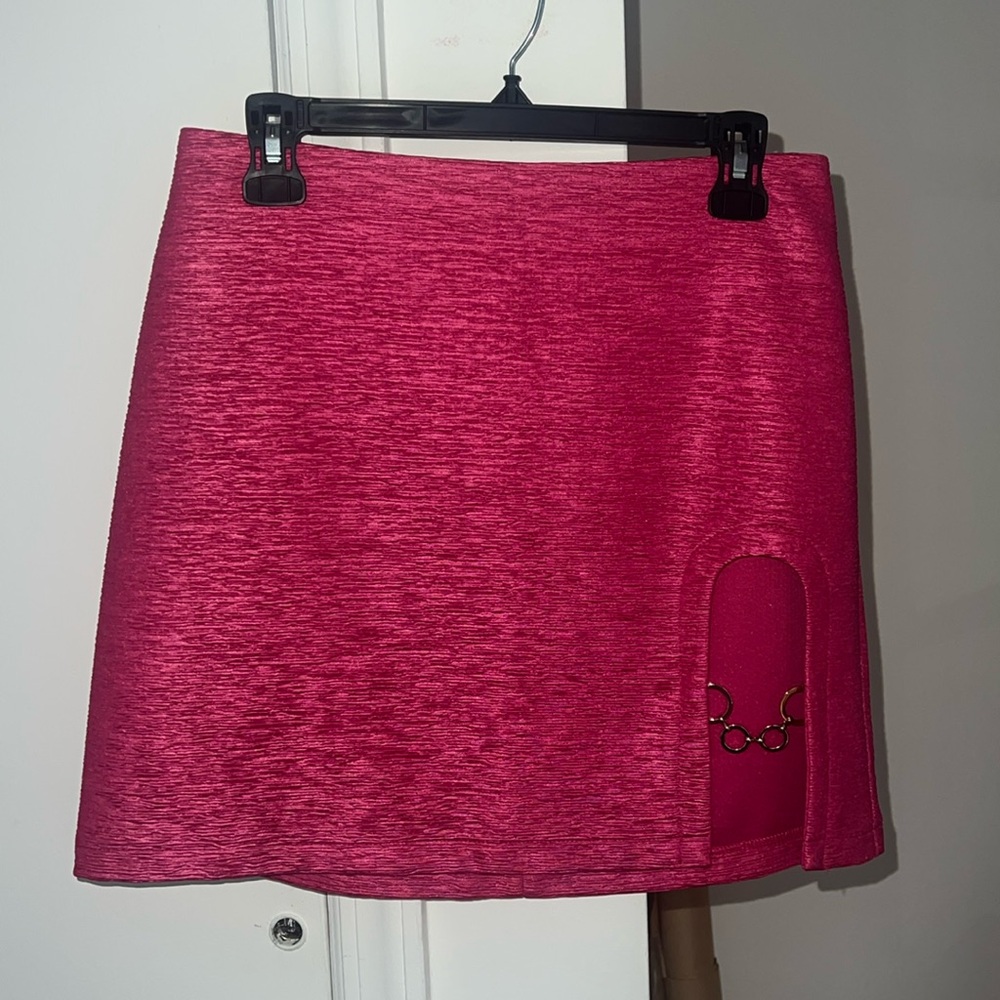Pink mini skirt with chain detail